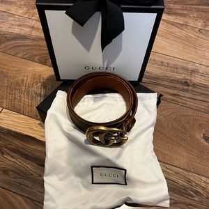 Worn once brown and gold belt